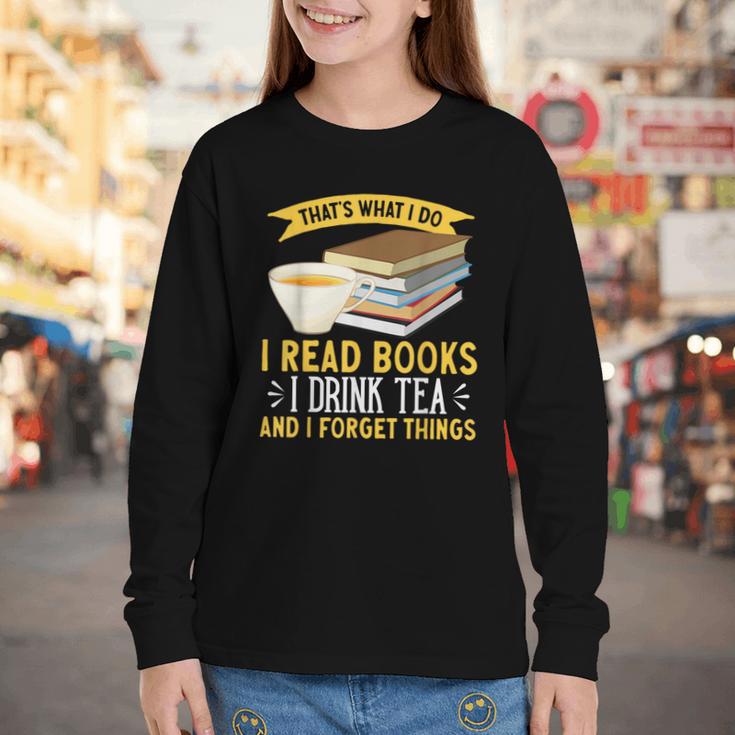 That’s What I Do Read Books I Drink Tea And I Forget Things Youth Long Sleeve Tee That’s What I Do Read Books I Drink Tea And I Forget Things Youth Long Sleeve Tee