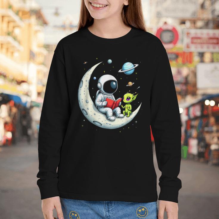 UFO Alien Astronaut Reading Book In Space Youth Long Sleeve Tee
