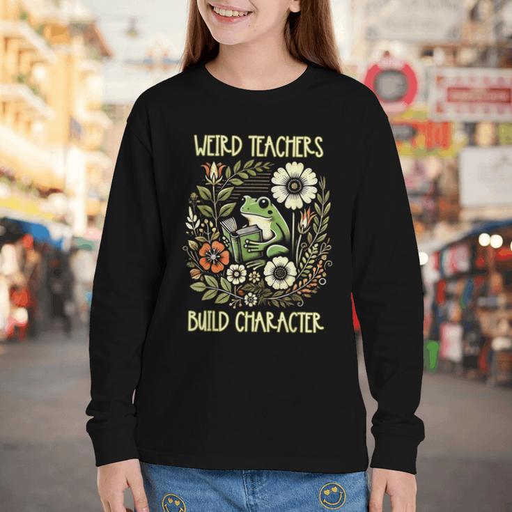 Weird Teachers Build Character Frog Reading Book Librarian Youth Long Sleeve Tee Weird Teachers Build Character Frog Reading Book Librarian Youth Long Sleeve Tee