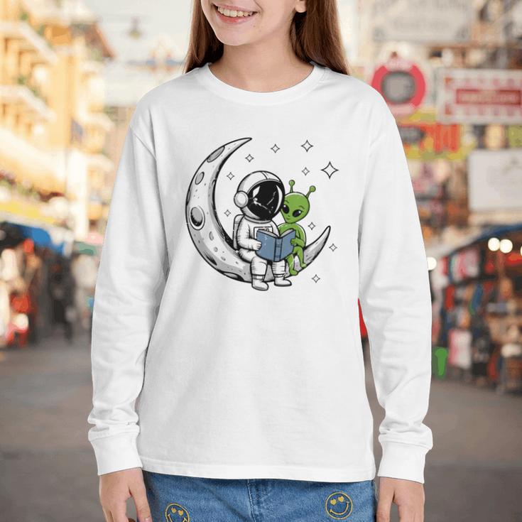 Astronaut Reading Book To Alien Moon Space Astronomy Youth Long Sleeve Tee
