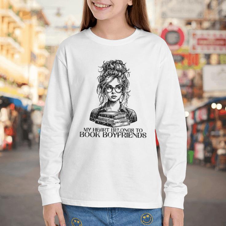 Book Lover Bent Over a Book Youth Long Sleeve Tee