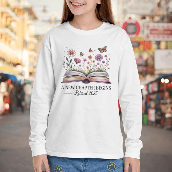 a New Chapter Begins Retired 2025 Floral Book Retirement Youth Long Sleeve Tee a New Chapter Begins Retired 2025 Floral Book Retirement Youth Long Sleeve Tee