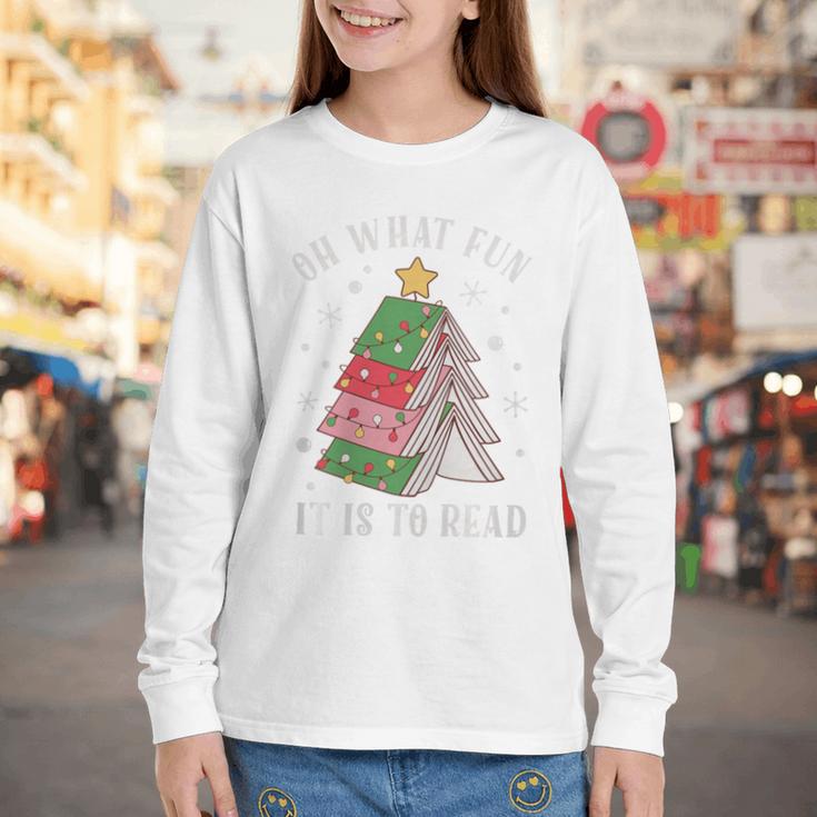 Oh What Fun It Is To Read Book Christmas Tree Premium Tri-Blend Youth Long Sleeve Tee Oh What Fun It Is To Read Book Christmas Tree Premium Tri-Blend Youth Long Sleeve Tee