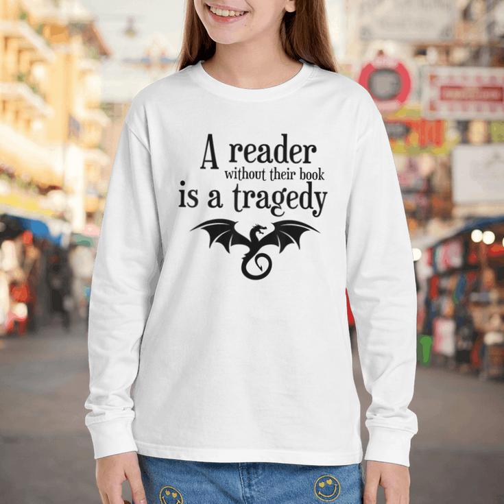 A Reader Without Their Book Is A Tragedy Dragon Rider Youth Long Sleeve Tee