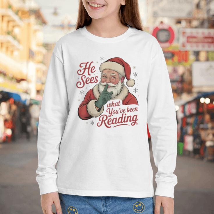 He Sees What You'Ve Been Reading Bookish Christmas Humor Youth Long Sleeve Tee