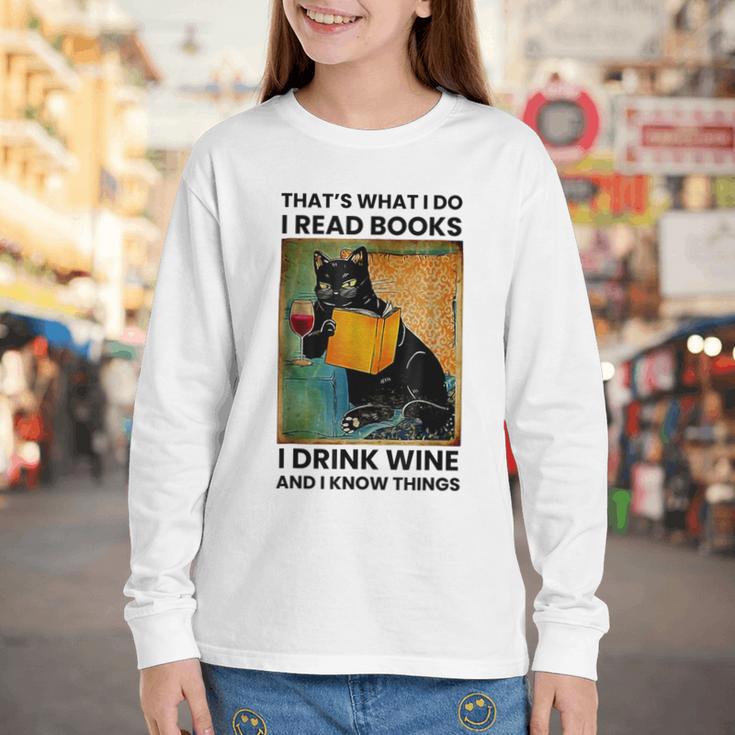 That's What I Do I Read Books I Drink Wine And I Know Things Youth Long Sleeve Tee That's What I Do I Read Books I Drink Wine And I Know Things Youth Long Sleeve Tee