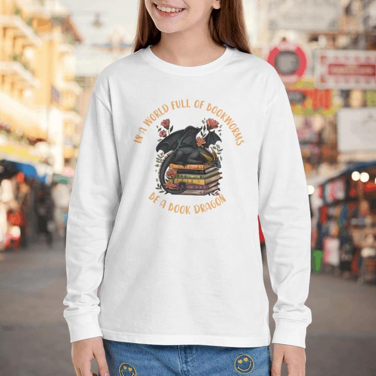 In A World Full Of Bookworms Be A Book Dragon Book Lover Youth Long Sleeve Tee