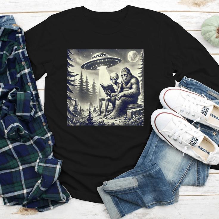 Bigfoot With Alien Reading A Book Bigfoot And UFO Youth Long Sleeve Tee