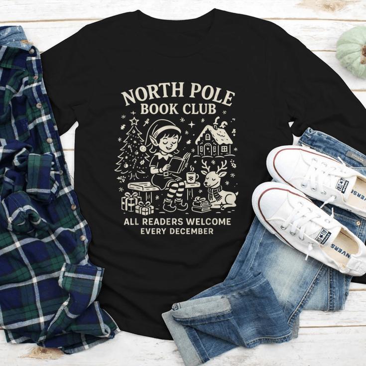 North Pole Book Club Christmas Elf Bookish Retro Graphic Youth Long Sleeve Tee North Pole Book Club Christmas Elf Bookish Retro Graphic Youth Long Sleeve Tee