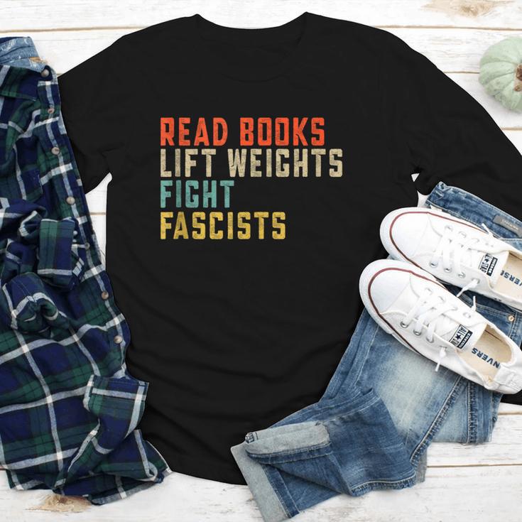 Read Books Lift Weights Fight Fascists Reading Youth Long Sleeve Tee Read Books Lift Weights Fight Fascists Reading Youth Long Sleeve Tee