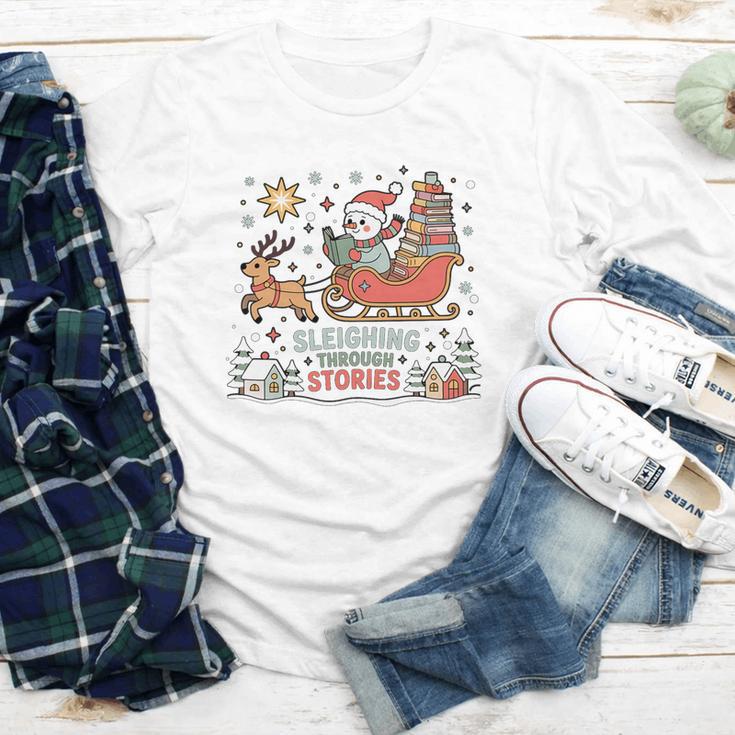 Book Lovers Winter Sleighing Through Stories Tee Premium Tri-Blend Youth Long Sleeve Tee