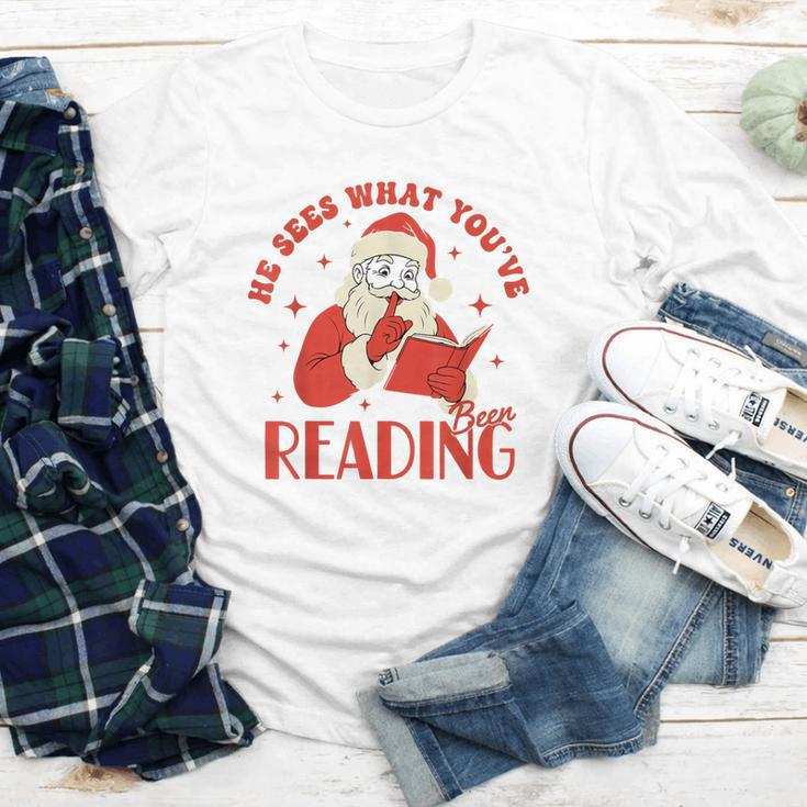He Sees What You'Ve Been Reading Santa Book Youth Long Sleeve Tee