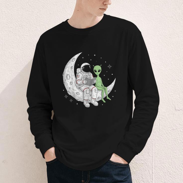 Astronaut Reading Book To Alien Moon Space Book Lover Men Youth Long Sleeve Tee