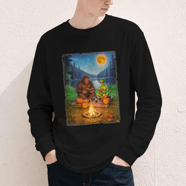 Bigfoot And Alien Reading Books Campfire Halloween Youth Long Sleeve Tee