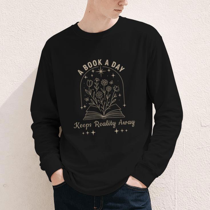 A Book A Day Keeps Reality Away Youth Long Sleeve Tee