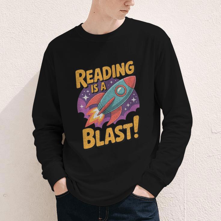 Book Lover Kids And Adults Reading Is a Blast Rocket Ship Youth Long Sleeve Tee Book Lover Kids And Adults Reading Is a Blast Rocket Ship Youth Long Sleeve Tee