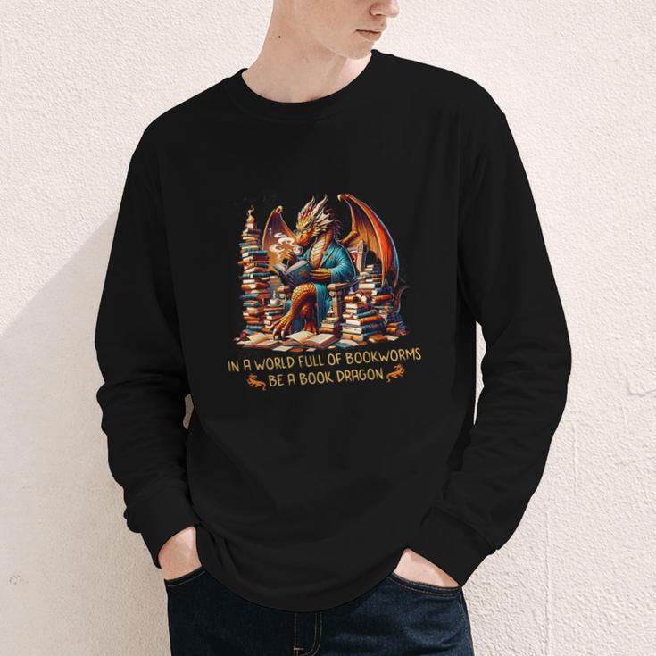 Book Lovers In A World Full Of Bookworms Be A Book Dragon Youth Long Sleeve Tee Book Lovers In A World Full Of Bookworms Be A Book Dragon Youth Long Sleeve Tee