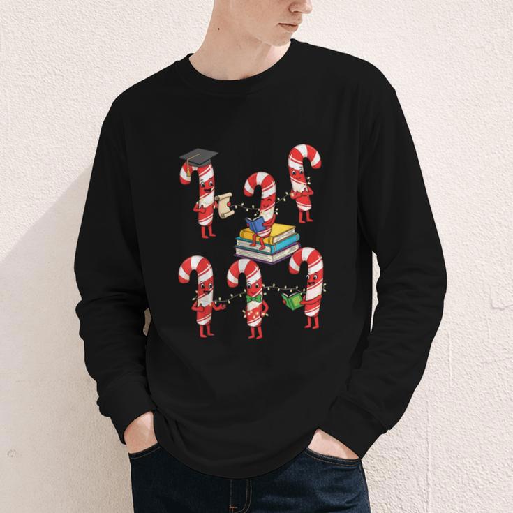 Bookmas Christmas Books Shirt Candy Cane Bookworm Youth Long Sleeve Tee