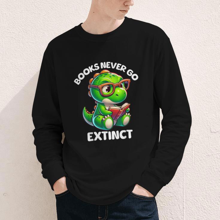Books Never Go Extinct Reading Dinosaur Bookish Nerdy Youth Long Sleeve Tee Books Never Go Extinct Reading Dinosaur Bookish Nerdy Youth Long Sleeve Tee