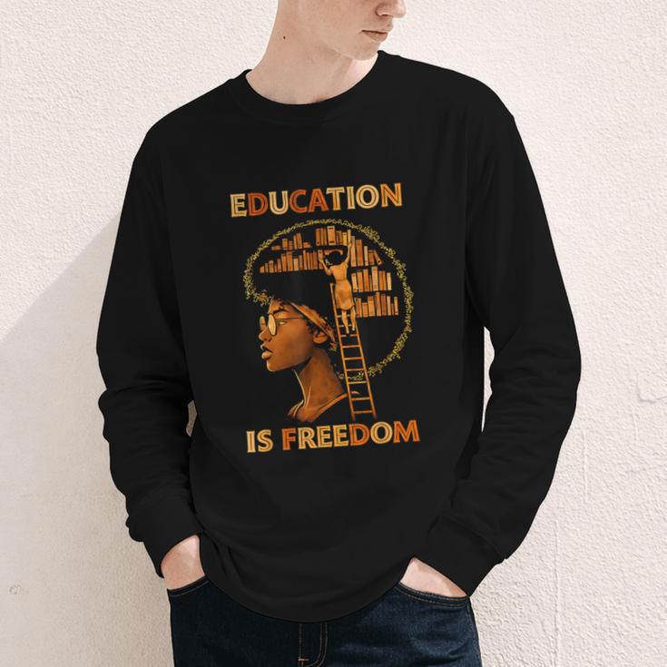 Education Is Freedom Teacher Book Black History Month Youth Long Sleeve Tee