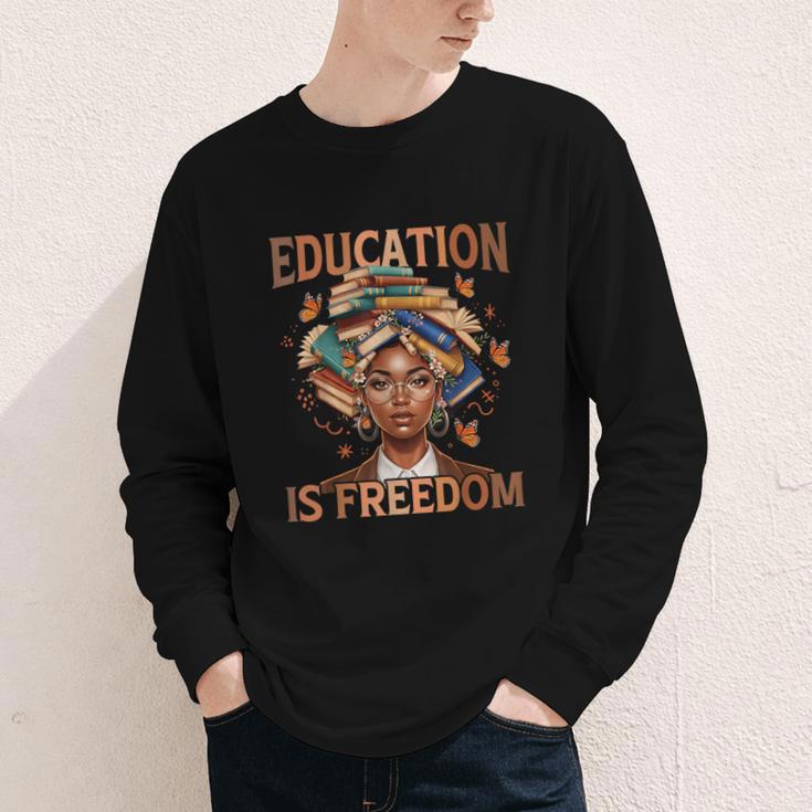 Education Is Freedom Teacher Books Black History Month Youth Long Sleeve Tee