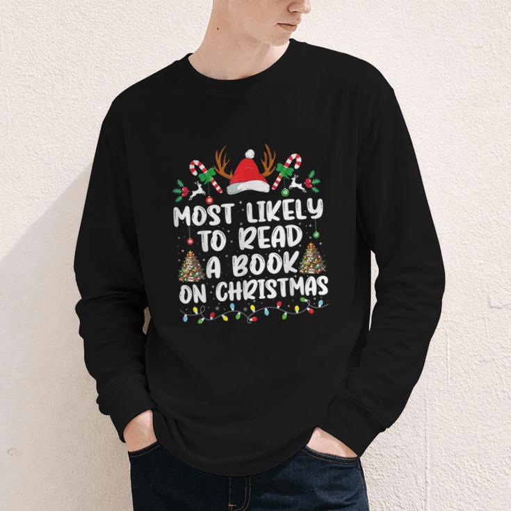 Most Likely To Read A Book On Christmas Matching Family Youth Long Sleeve Tee