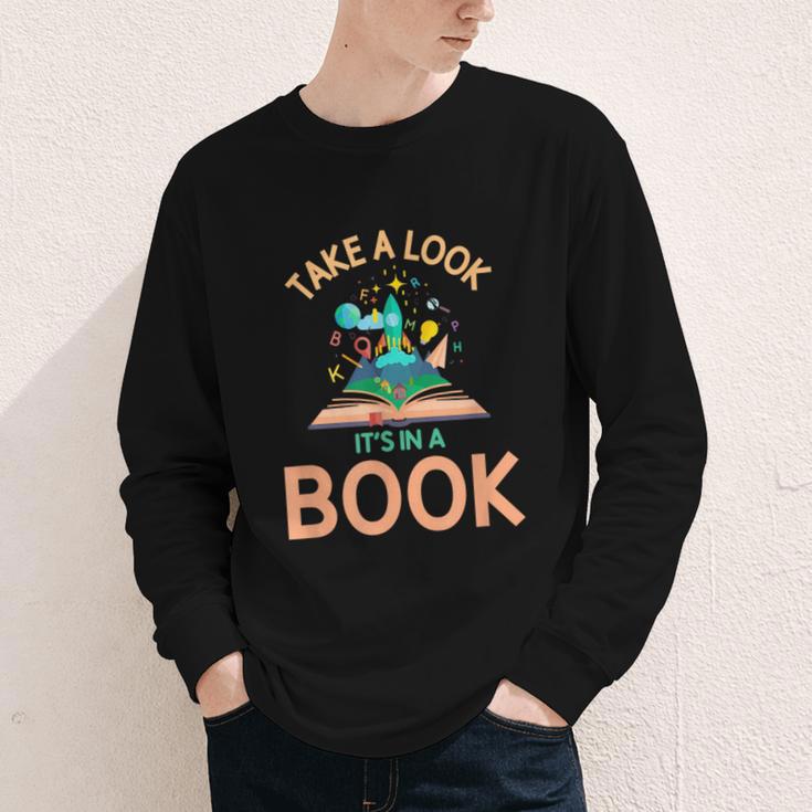 Take a Look It's In a Book Reading Teacher Book Lover Youth Long Sleeve Tee