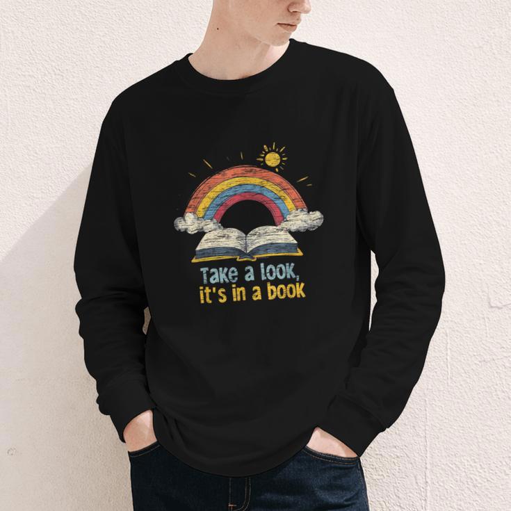 Take a Look It's In a Book Vintage Reading Teacher Rainbow Youth Long Sleeve Tee