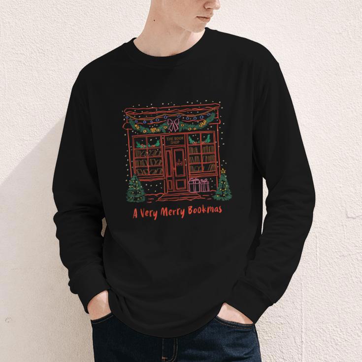 A Very Merry Bookmas Cozy Christmas Bookstore Holiday Cute Youth Long Sleeve Tee A Very Merry Bookmas Cozy Christmas Bookstore Holiday Cute Youth Long Sleeve Tee