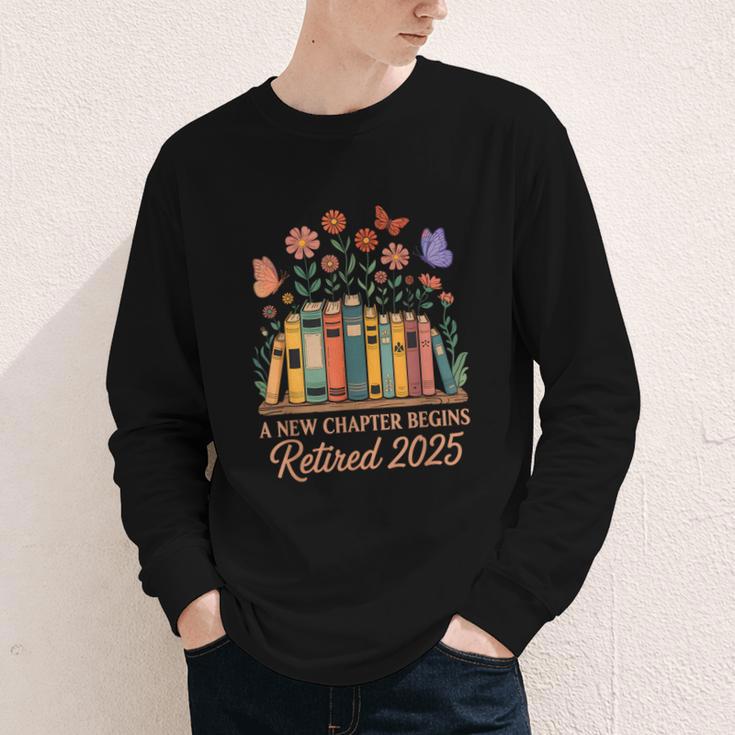 A New Chapter Begins Retired 2025 Books Flowers Youth Long Sleeve Tee A New Chapter Begins Retired 2025 Books Flowers Youth Long Sleeve Tee