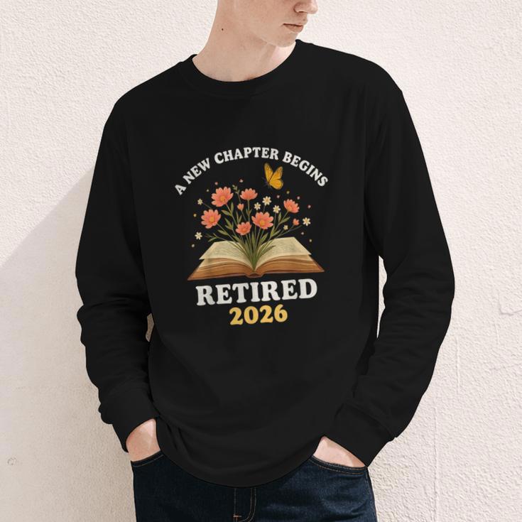 A New Chapter Begins Retired 2026 Floral Book Butterfly Tee Youth Long Sleeve Tee