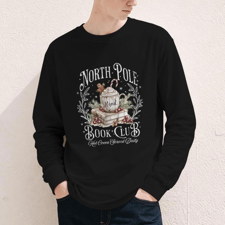 North Pole Book Club Hot Cocoa Served Daily Youth Long Sleeve Tee
