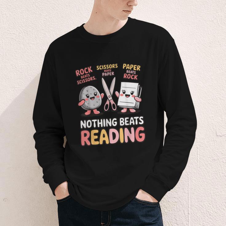 Nothing Goes Beyond Reading Rock Paper Scissors Book Youth Long Sleeve Tee Nothing Goes Beyond Reading Rock Paper Scissors Book Youth Long Sleeve Tee