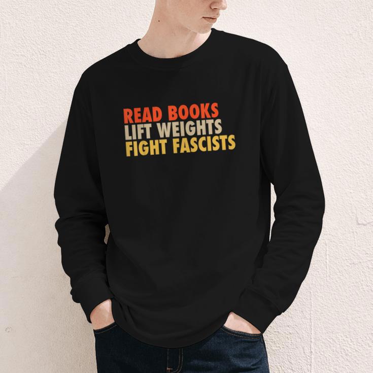 Read Books Lift Weights Fight Fascists Reading Humor Youth Long Sleeve Tee Read Books Lift Weights Fight Fascists Reading Humor Youth Long Sleeve Tee
