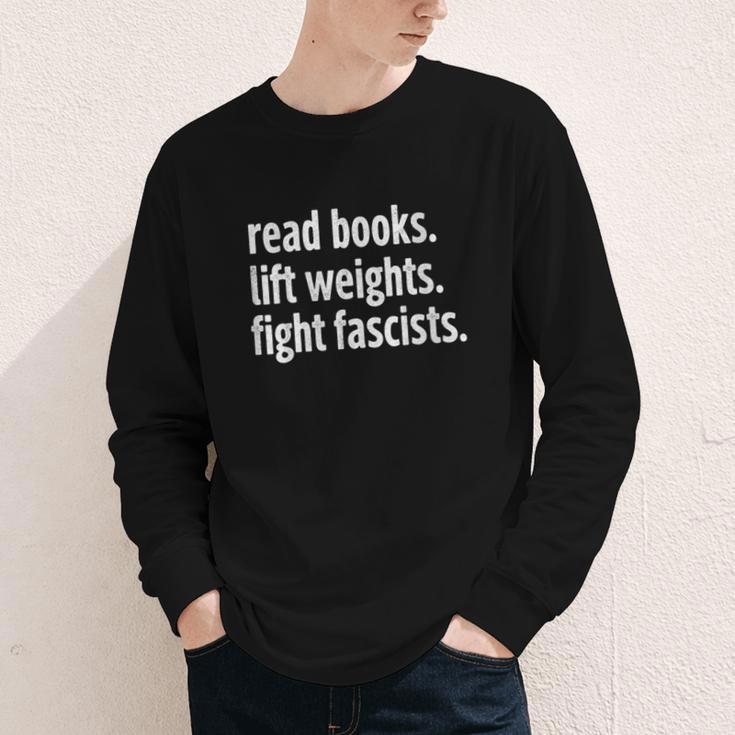 Read Books Lift Weights Fight Fascists Reading Lovers Youth Long Sleeve Tee Read Books Lift Weights Fight Fascists Reading Lovers Youth Long Sleeve Tee