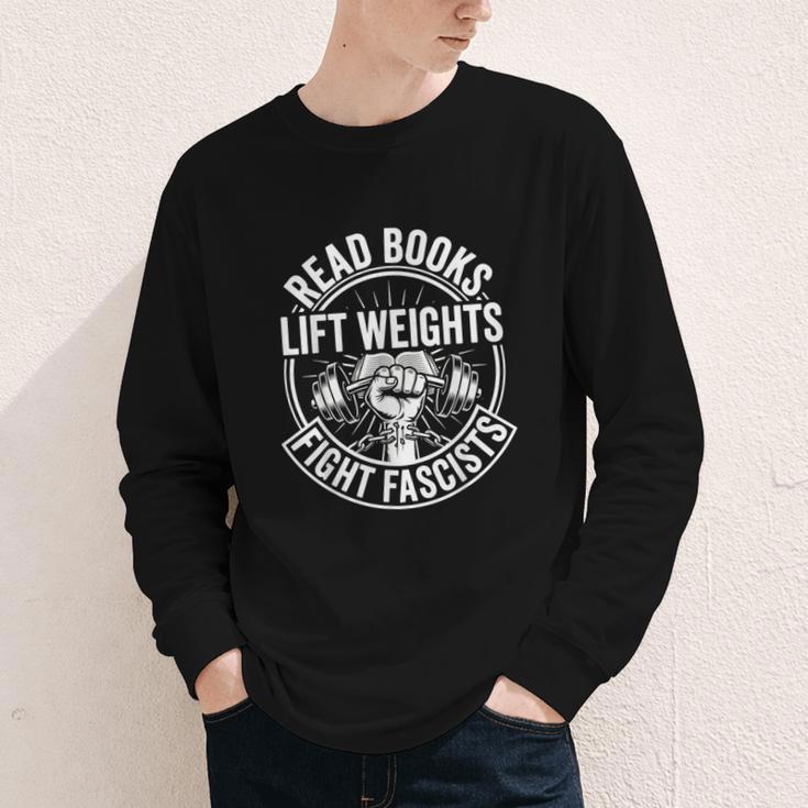 Read Books Lift Weights Fight Fascists Reading Men Women Youth Long Sleeve Tee Read Books Lift Weights Fight Fascists Reading Men Women Youth Long Sleeve Tee
