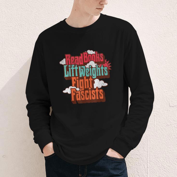 Read Books Lift Weights Fight Fascists Reading No Kings Youth Long Sleeve Tee
