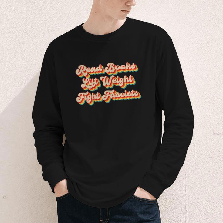 Read Books Lift Weights Fight Fascists Retro Reading Youth Long Sleeve Tee Read Books Lift Weights Fight Fascists Retro Reading Youth Long Sleeve Tee