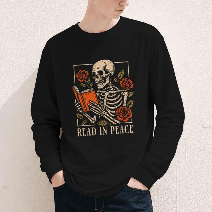 Read In Peace Skeleton Reading Book Halloween Teacher Youth Long Sleeve Tee