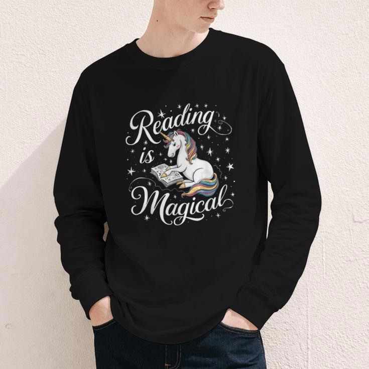 Reading Is Magical Unicorn Book Lover Fantasy Kids Youth Long Sleeve Tee Reading Is Magical Unicorn Book Lover Fantasy Kids Youth Long Sleeve Tee