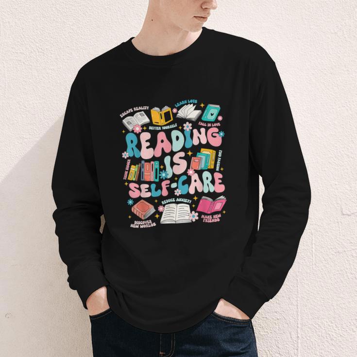 Reading Is Self-Care Book Lover Teacher Student Men Women Youth Long Sleeve Tee Reading Is Self-Care Book Lover Teacher Student Men Women Youth Long Sleeve Tee