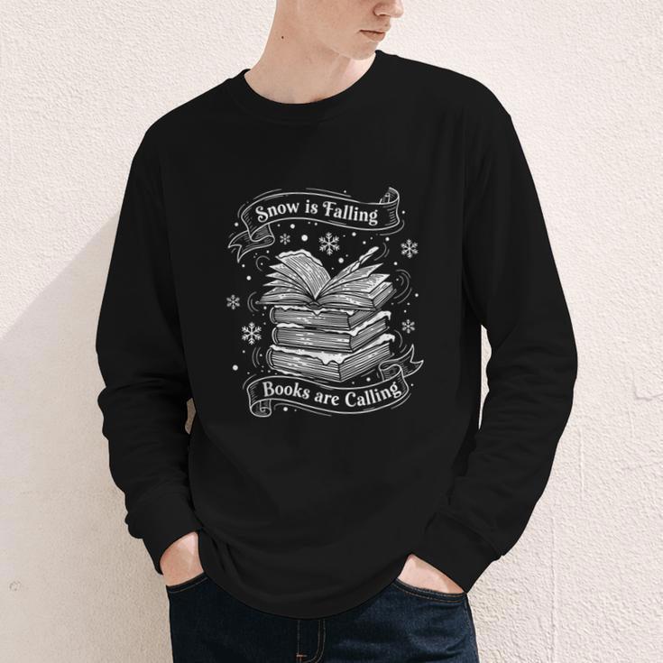 Snow Is Falling Books Are Calling Winter Reading Youth Long Sleeve Tee