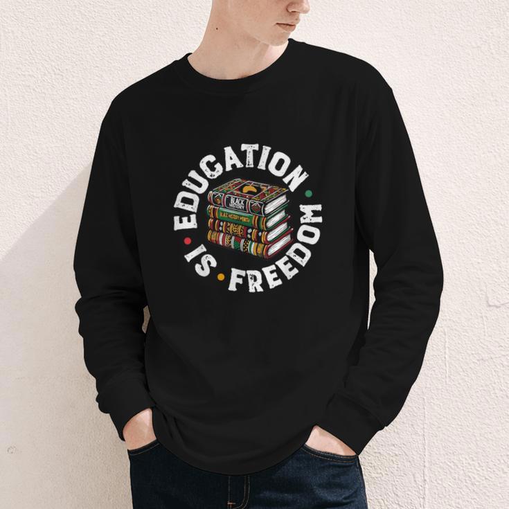 History Education Is Freedom Books Teach Black History Youth Long Sleeve Tee