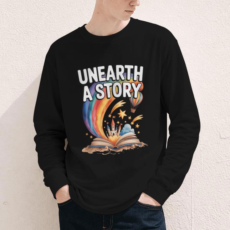 Unearth A Story Rainbow Treasure Book Youth Long Sleeve Tee