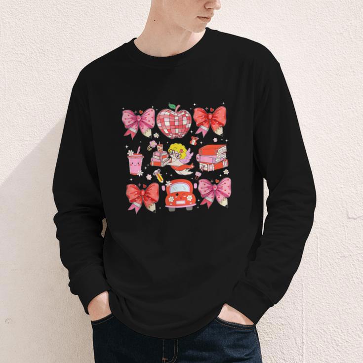 Valentine Cupid Coquette Pink Bow Apple Books Teacher Youth Long Sleeve Tee Valentine Cupid Coquette Pink Bow Apple Books Teacher Youth Long Sleeve Tee