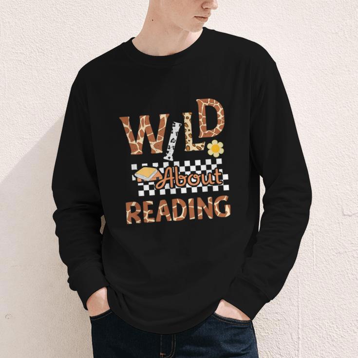 Wild About Reading Teacher Reading Books Back To School Youth Long Sleeve Tee