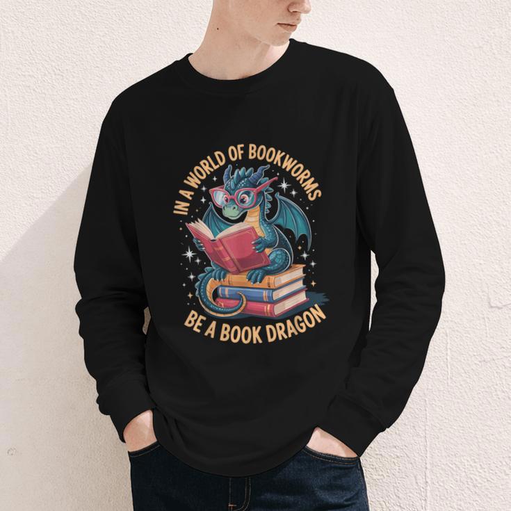 In A World Of Bookworms Be A Book Dragon Youth Long Sleeve Tee
