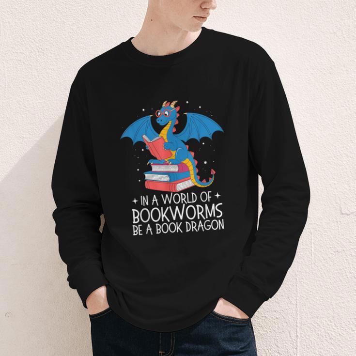 In A World Full Of Bookworms Be A Book Dragon Reading Youth Long Sleeve Tee In A World Full Of Bookworms Be A Book Dragon Reading Youth Long Sleeve Tee