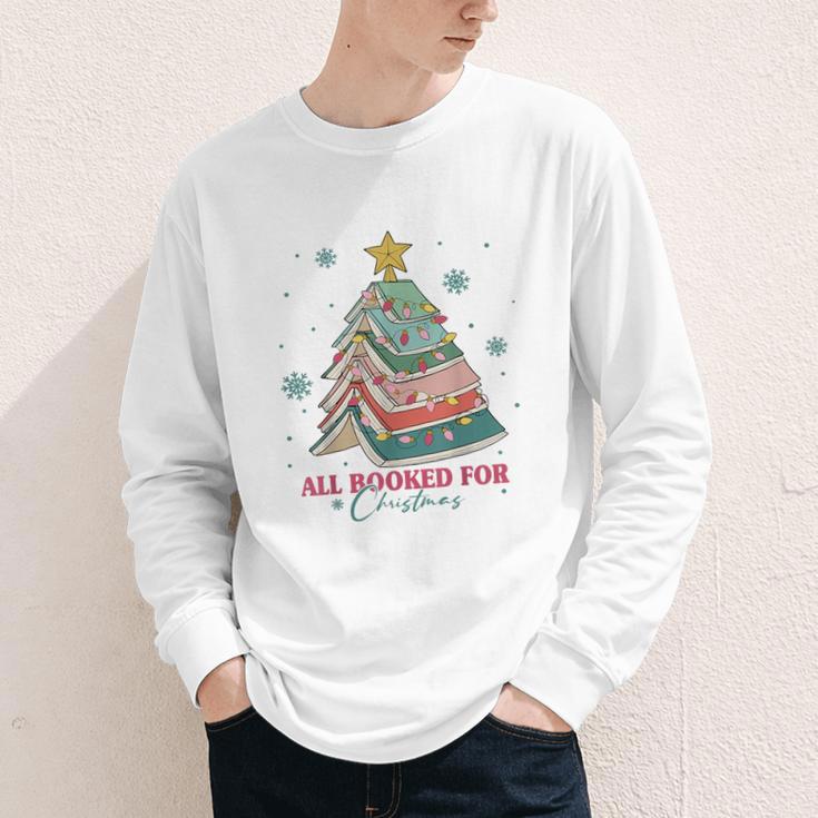 All Booked For Christmas Book Christmas Tree Lights Bookish Youth Long Sleeve Tee All Booked For Christmas Book Christmas Tree Lights Bookish Youth Long Sleeve Tee