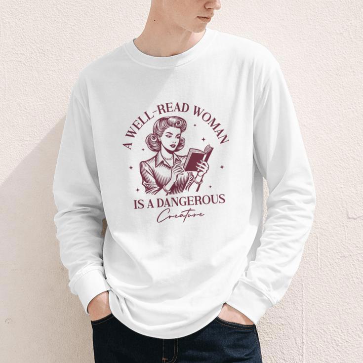 Books A Well-Read Woman Is A Dangerous Creature Women Premium Tri-Blend Youth Long Sleeve Tee Books A Well-Read Woman Is A Dangerous Creature Women Premium Tri-Blend Youth Long Sleeve Tee